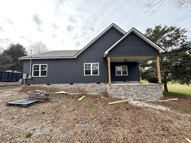 exterior space featuring ceiling fan