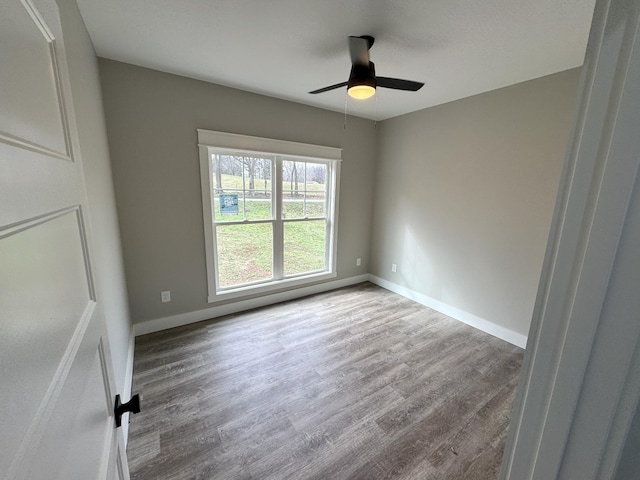 unfurnished bedroom with hardwood / wood-style floors and ceiling fan