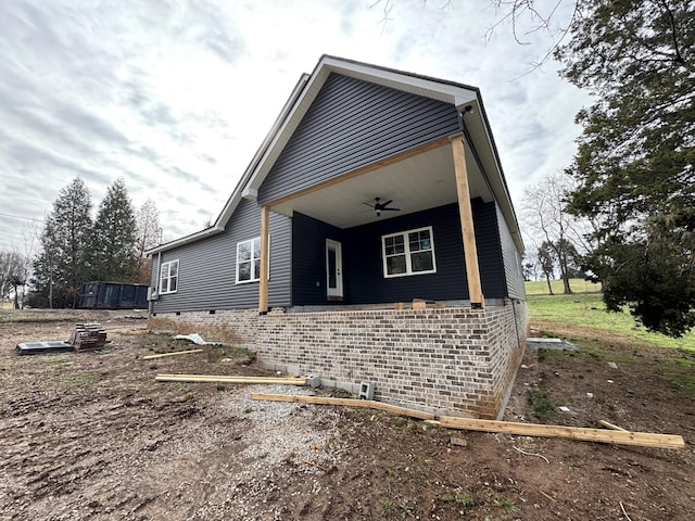 view of property exterior with ceiling fan