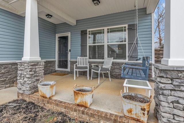 view of patio / terrace with a porch