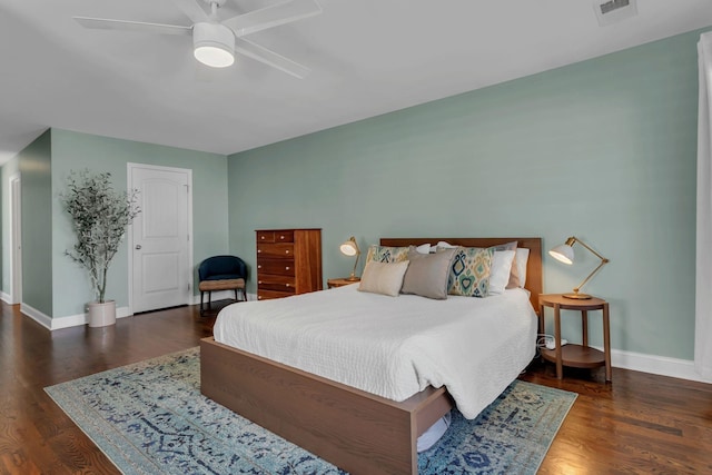 bedroom featuring dark wood-type flooring and ceiling fan