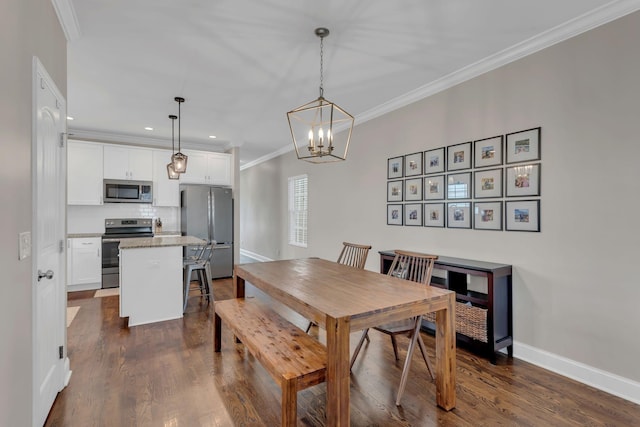 dining space with crown molding, dark hardwood / wood-style floors, and an inviting chandelier