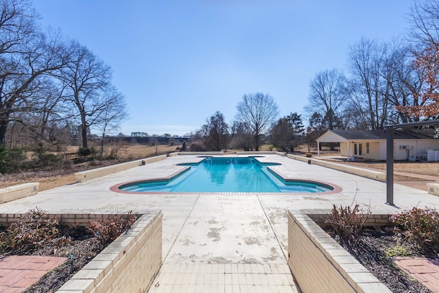 view of pool with a patio