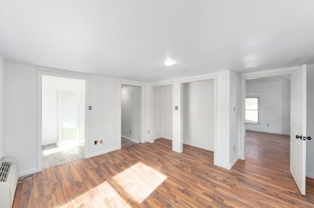 spare room featuring dark hardwood / wood-style floors