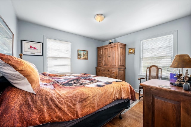 bedroom with light wood-type flooring