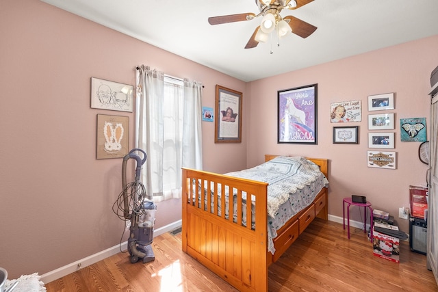 126 Andrea Ln, Monterey, TN 38574 - bedroom with a ceiling fan, baseboards, and wood finished floors