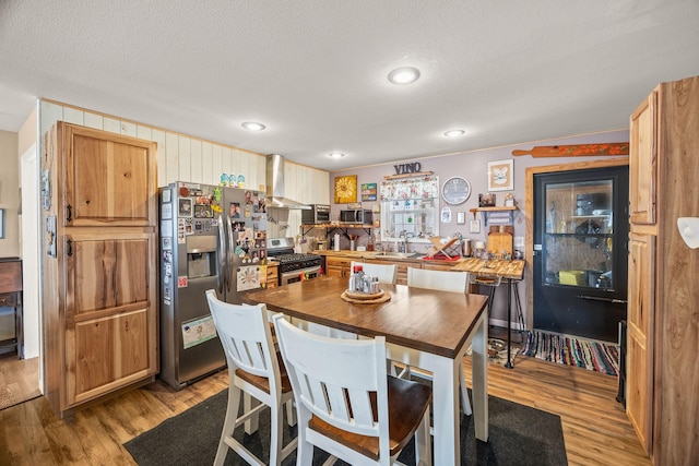 126 Andrea Ln, Monterey, TN 38574 - dining space featuring recessed lighting, light wood-style flooring, and a textured ceiling