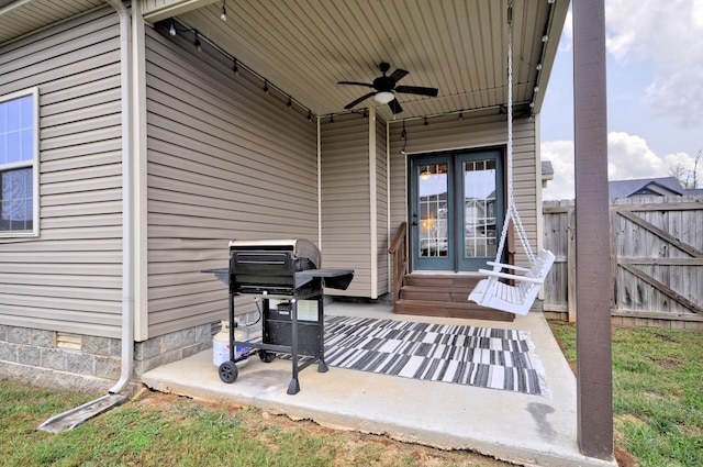 view of patio featuring ceiling fan and area for grilling