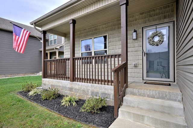 property entrance featuring a porch