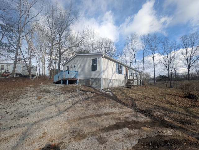 view of home's exterior featuring crawl space