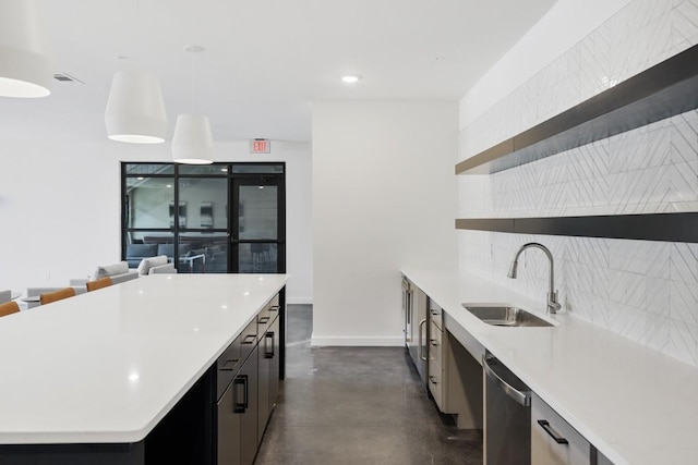 kitchen with dishwasher, decorative light fixtures, a center island, backsplash, and sink