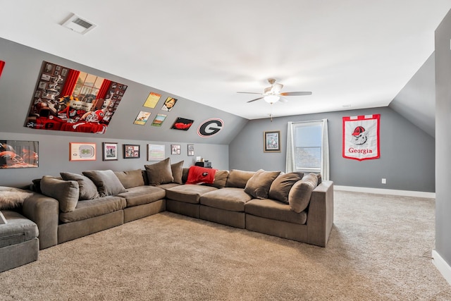 carpeted living room with vaulted ceiling, ceiling fan, visible vents, and baseboards