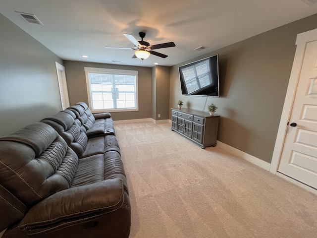 living area featuring ceiling fan, recessed lighting, light colored carpet, visible vents, and baseboards