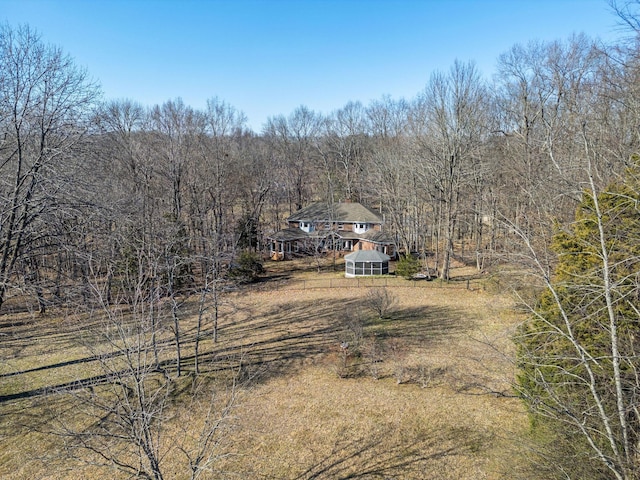 drone / aerial view with a forest view