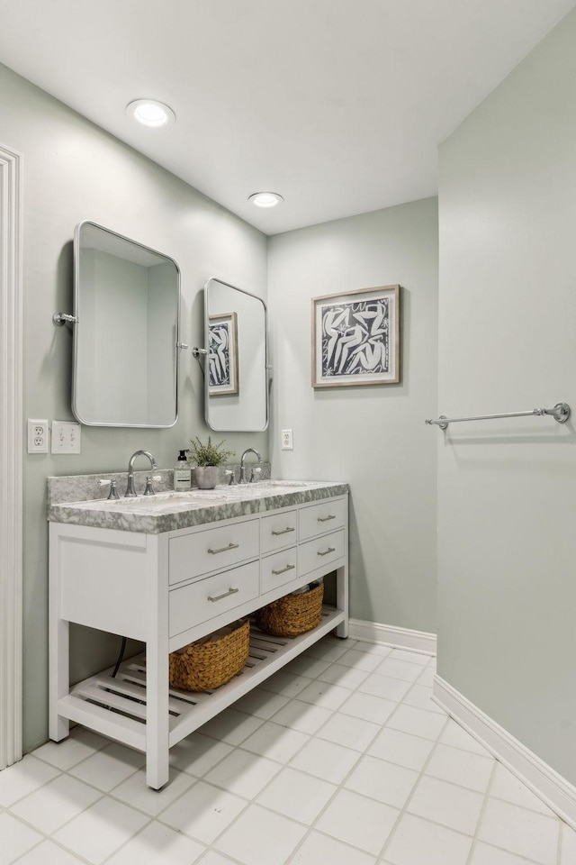 bathroom with vanity and tile patterned flooring