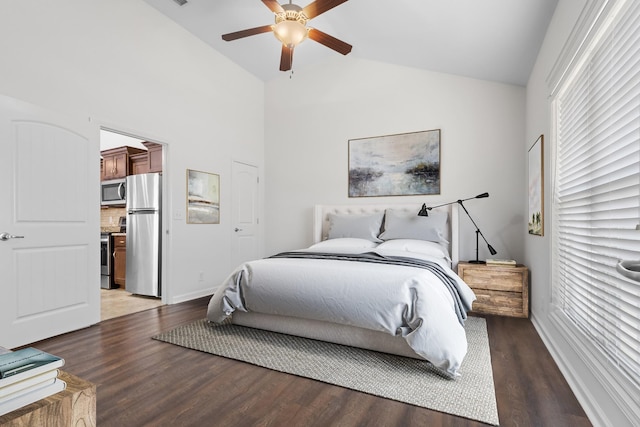 bedroom with dark hardwood / wood-style floors, high vaulted ceiling, stainless steel fridge, and ceiling fan