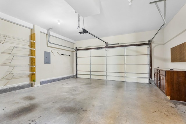 garage with electric panel and a garage door opener