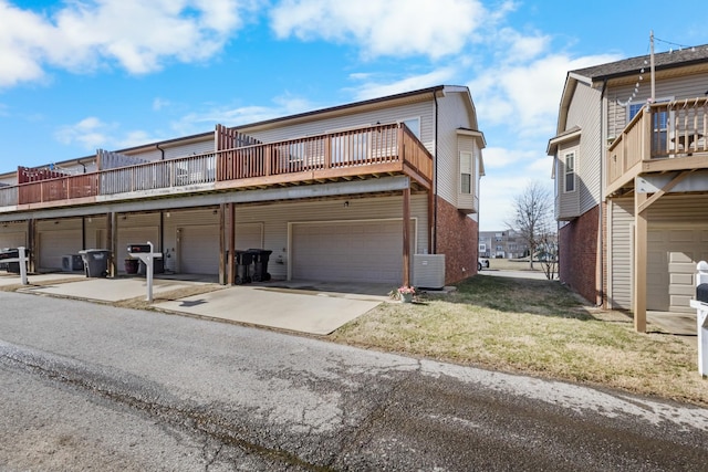 exterior space featuring cooling unit and a balcony