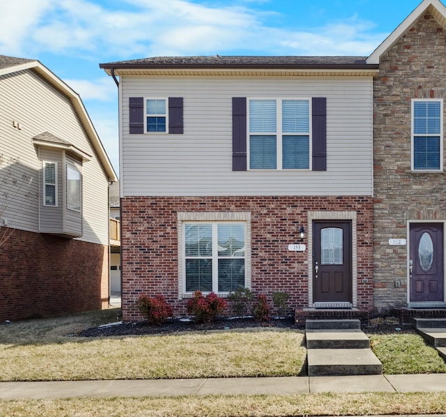 view of front property with a front lawn