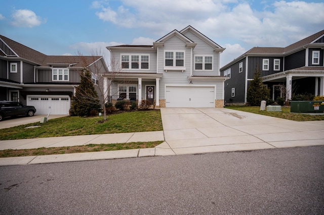 view of front facade featuring a garage and a front yard