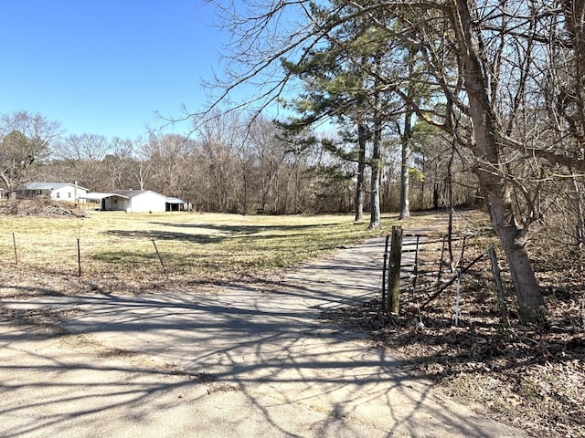 view of street with aphalt driveway