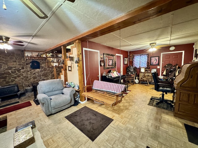 living room featuring parquet floors and ceiling fan