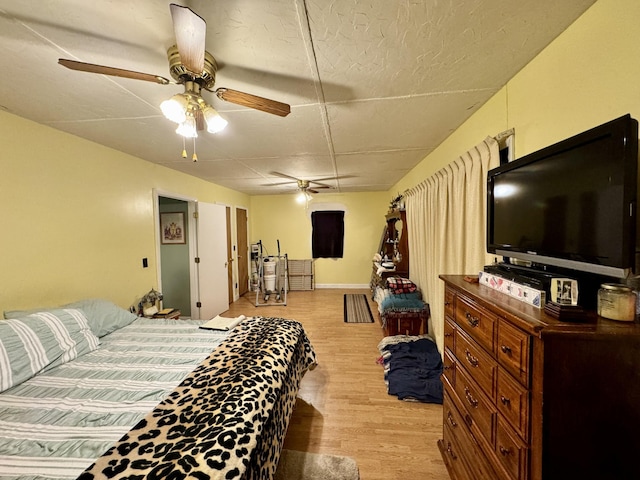 bedroom with light hardwood / wood-style flooring