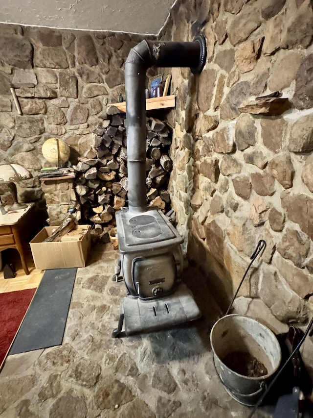 interior details featuring a wood stove