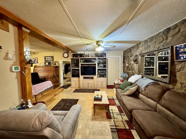 living room featuring ceiling fan