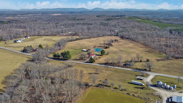 aerial view with a mountain view and a rural view