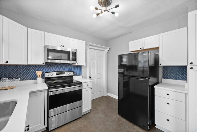 kitchen featuring sink, white cabinets, tasteful backsplash, and stainless steel appliances