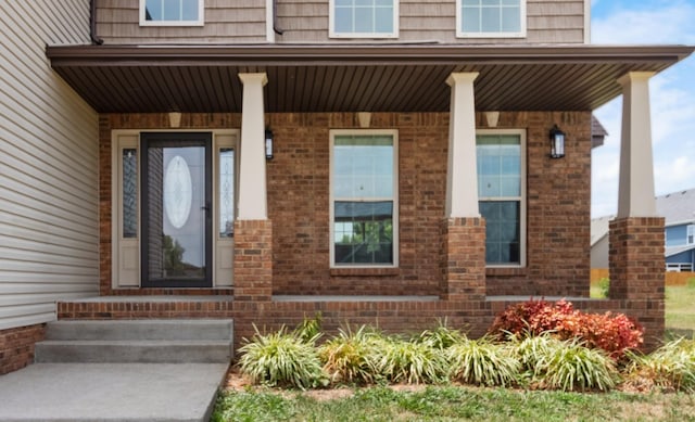 property entrance featuring covered porch