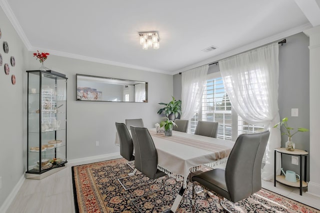 dining room with ornamental molding