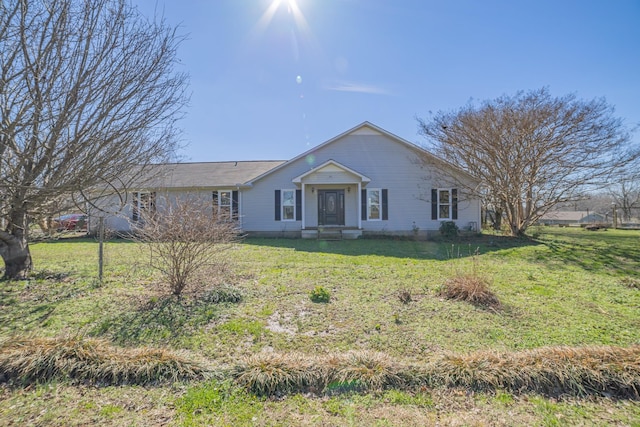 single story home with a front yard