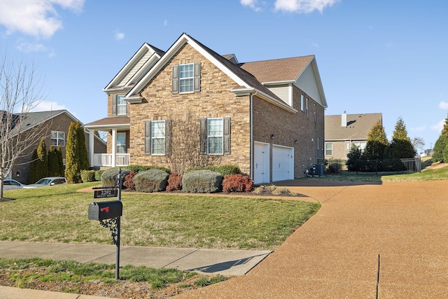 view of front of property with stone siding, a garage, concrete driveway, cooling unit, and a front yard