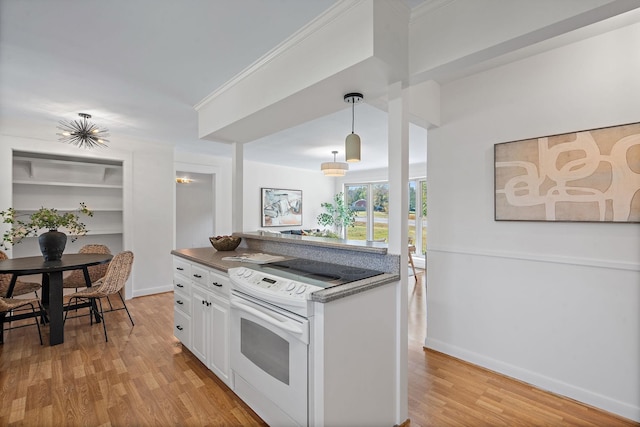 kitchen with light wood-type flooring, decorative light fixtures, white electric range oven, built in features, and white cabinets