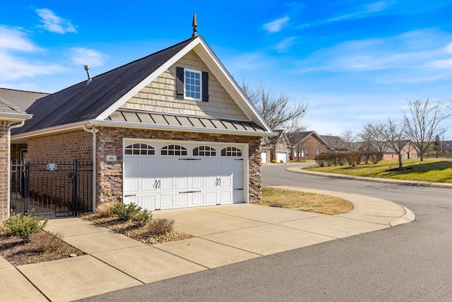 view of side of property featuring a garage