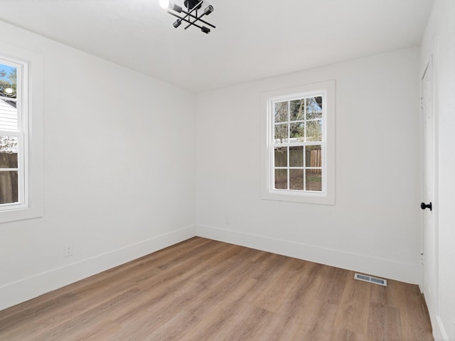 empty room featuring light hardwood / wood-style floors