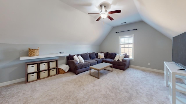 carpeted living room featuring ceiling fan and vaulted ceiling