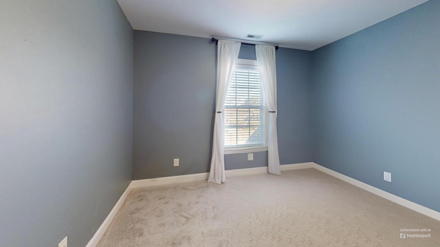 view of carpeted spare room