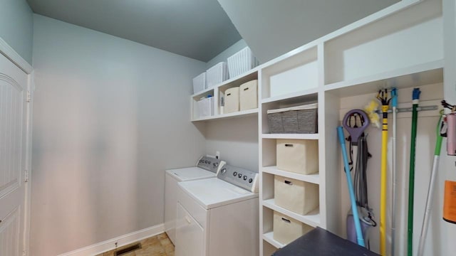 laundry area featuring washing machine and dryer