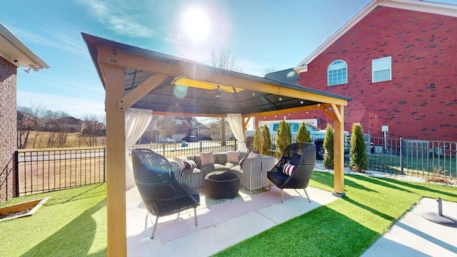 view of patio with outdoor lounge area and a gazebo