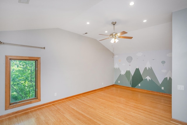 bonus room featuring ceiling fan, vaulted ceiling, and wood-type flooring