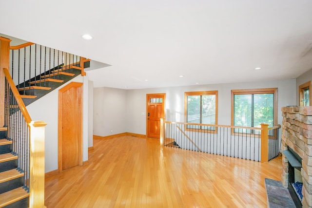 entryway with light hardwood / wood-style floors