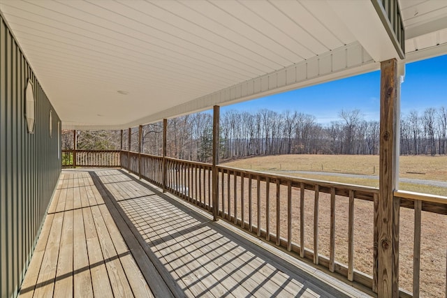 wooden terrace with a rural view