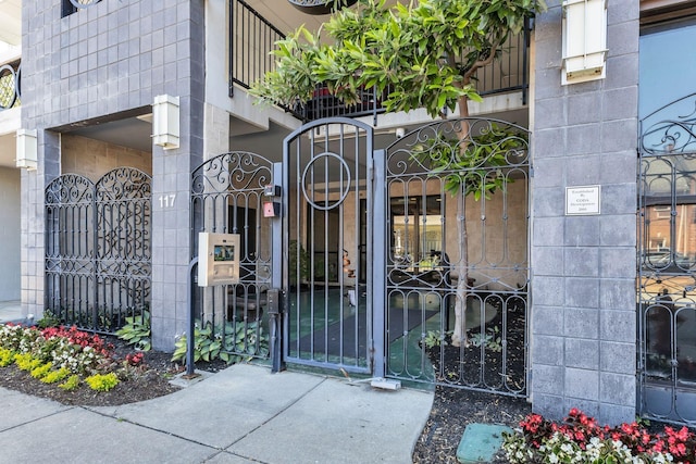 view of gate featuring fence