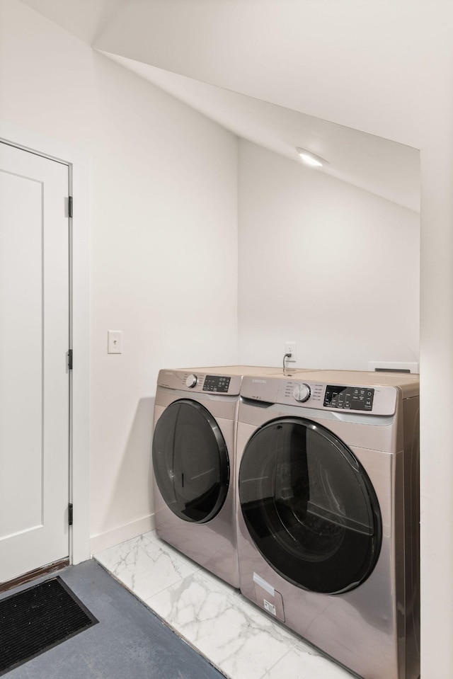 laundry room with independent washer and dryer