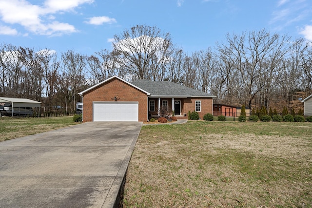 single story home with a garage and a front lawn