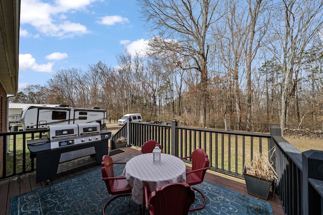 wooden deck with a yard