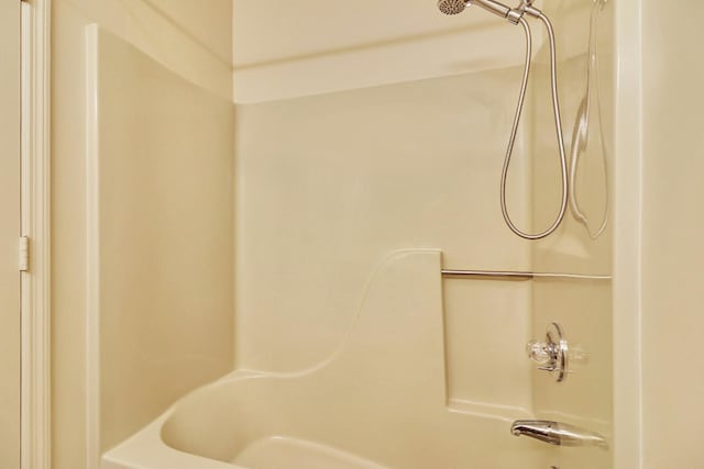 bathroom featuring washtub / shower combination